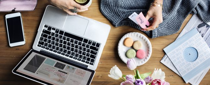 Woman Using Laptop Shopping Online