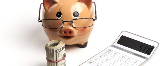 Piggy Bank With White Calculator